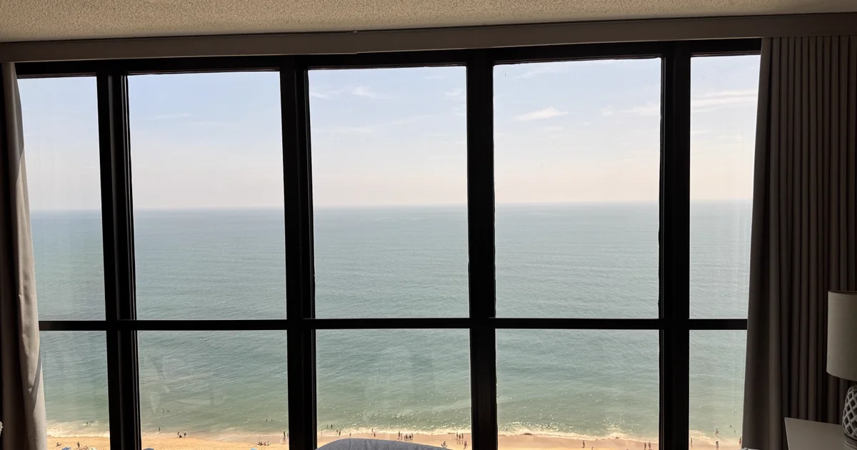Ocean view through the wide windows of a Sea Colony condo